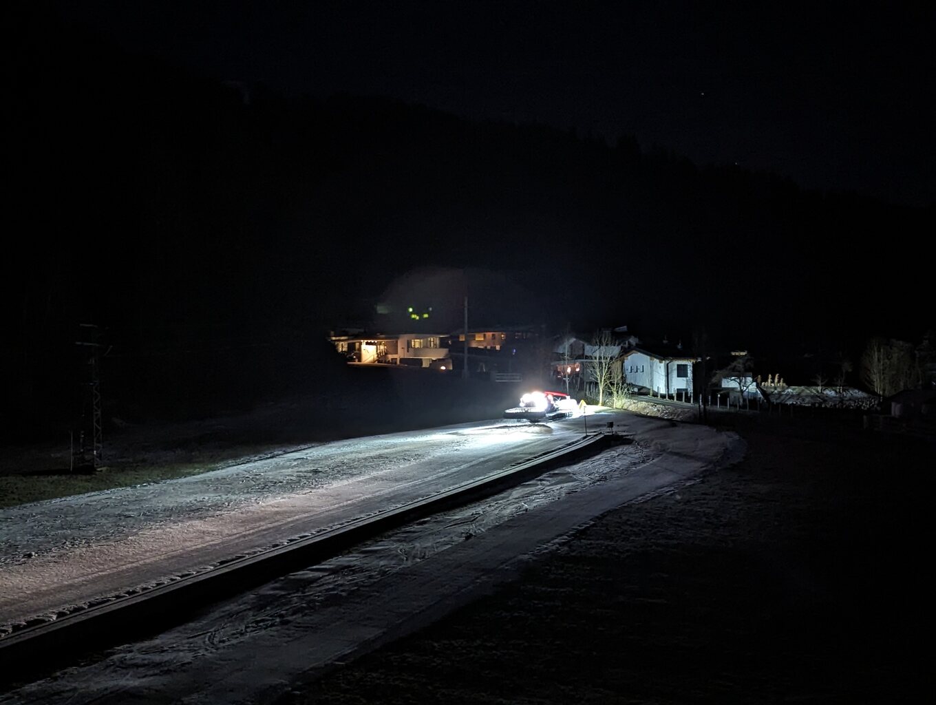 Pistenbully vom Balkon aus beobachten